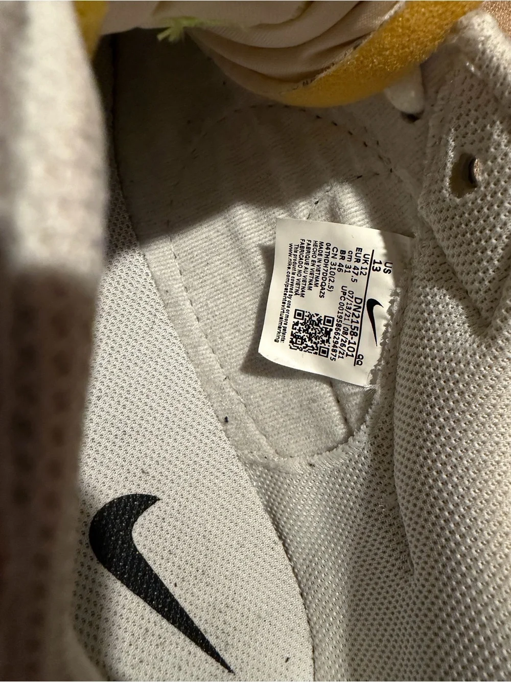 Nike Kids White Sneakers with Black Swoosh